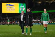 3 December 2024; Republic of Ireland head coach Eileen Gleeson with Niamh Fahey and Anna Patten, rigth, after the UEFA Women's EURO 2025 Play-off Round Two second leg match between Republic of Ireland and Wales at the Aviva Stadium in Dublin. Photo by Stephen McCarthy/Sportsfile