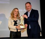 6 December 2024; Galway United and Republic of Ireland's Julie-Ann Russell is presented with the SSE Airtricity/Soccer Writers Ireland 2024 Women's Personality of the Year Award by Minister of State at the Department of Tourism, Culture, Arts, Gaeltacht, Sport and Media and Equality, Thomas Byrne TD during the SSE Airtricity/Soccer Writers Ireland Awards 2024 at Clontarf Castle in Dublin. Photo by Stephen McCarthy/Sportsfile