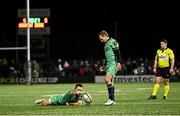7 December 2024; Caolin Blade of Connacht holds the ball in place for a conversion attempt by team-mate Jack Carty, right, during the EPCR Challenge Cup Round 1 match between Connacht and Zebre Parma at Dexcom Stadium in Galway. Photo by Piaras Ó Mídheach/Sportsfile