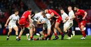 8 December 2024; Stuart McCloskey of Ulster is tackled by Alexandre Roumat and Emmanuel Meafou of Toulouse during the Champions Cup Round 1 match between Toulouse and Ulster at Stade Ernest Wallon in Toulouse, France. Photo by John Dickson/Sportsfile