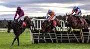10 December 2024; Hey Sunshine, with Paul Townend up, clears the last, ahead of Cottesloe Sunshine, with Oakley Brown up, centre, who finished third, and Tareze, with Darragh O'Keefe up, who finished second, on their way to winning the Buy Your Punchestown Christmas Gift Mares Novice Hurdle at Punchestown Racecourse in Kildare. Photo by Thomas Doolin/Sportsfile