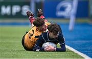 12 December 2024; Felix Madden Geoghan of East Glendalough is tackled by James McEntee of Ashbourne Community School during the Leinster Rugby Schools League Pat Rossiter Cup Final match between East Glendalough, Wicklow, and Ashbourne Community School, Meath, at Energia Park in Dublin. Photo by Seb Daly/Sportsfile