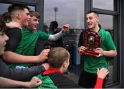12 December 2024; Boyne Community School Trim captain Tymon Marcyniak with the trophy and teammates after their side's victory in the Leinster Rugby Schools League Junior Development Shield Final match between Moate Community School, Westmeath, and Boyne Community School Trim, Meath, at Energia Park in Dublin. Photo by Seb Daly/Sportsfile