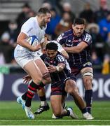 14 December 2024; Stuart McCloskey of Ulster is tackled by Yoram Moefana of Bordeaux-Begles during the Champions Cup Pool 1 match between Ulster and Bordeaux Begles at Kingspan Stadium in Belfast. Photo by Ramsey Cardy/Sportsfile