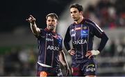 14 December 2024; Arthur Retiere, left, and Joey Carbery of Bordeaux-Begles during the Champions Cup Pool 1 match between Ulster and Bordeaux Begles at Kingspan Stadium in Belfast. Photo by Ramsey Cardy/Sportsfile