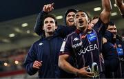 14 December 2024; Bordeaux-Begles players including Joey Carbery and Yoram Moefana celebrate after the Champions Cup Pool 1 match between Ulster and Bordeaux Begles at Kingspan Stadium in Belfast. Photo by Ramsey Cardy/Sportsfile