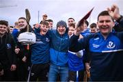 15 December 2024; Sarsfields players and supporters celebrate after their side's victory in the AIB GAA Hurling All-Ireland Senior Club Championship semi-final match between Sarsfields of Cork and Slaughtneil of Derry at Cedral St Conleth's Park in Newbridge, Kildare. Photo by Piaras Ó Mídheach/Sportsfile