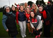 15 December 2024; Niamh O'Keeffe of Mungret St Paul’s celebrates with supporters after their side's victory in the 2024 AIB All-Ireland Ladies Junior Club Football Championship Final match between Mungret St Paul’s, Limerick, and Na Dúnaibh, Donegal, at Parnell Park in Dublin. Photo by Seb Daly/Sportsfile