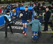 21 December 2024; Leinster mascots Kevin Menton and Douglas Geddes with Jordie Barrett of Leinster before the United Rugby Championship match between Leinster and Connacht at the Aviva Stadium in Dublin. Photo by Brendan Moran/Sportsfile