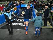 21 December 2024; Leinster mascots Kevin Menton and Douglas Geddes with Jordie Barrett of Leinster before the United Rugby Championship match between Leinster and Connacht at the Aviva Stadium in Dublin. Photo by Brendan Moran/Sportsfile