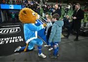 21 December 2024; Leinster mascots Kevin Menton and Douglas Geddes with Leo the Lion before the United Rugby Championship match between Leinster and Connacht at the Aviva Stadium in Dublin. Photo by Brendan Moran/Sportsfile