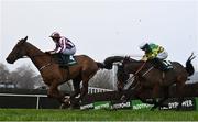 27 December 2024; Jeannot Lapin, with Ricky Doyle up, left, on their way to winning the Paddy Power Beginners Steeplechase on day two of the Leopardstown Christmas Festival at Leopardstown Racecourse in Dublin. Photo by David Fitzgerald/Sportsfile