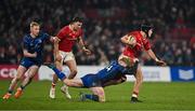 27 December 2024; Mike Haley of Munster is tackled by Tommy O'Brien of Leinster during the United Rugby Championship match between Munster and Leinster at Thomond Park in Limerick. Photo by Brendan Moran/Sportsfile