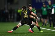 28 December 2024; Santiago Cordero of Connacht is tackled by Michael Lowry of Ulster during the United Rugby Championship match between Connacht and Ulster at the Dexcom Stadium in Galway. Photo by Seb Daly/Sportsfile