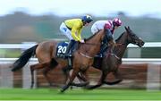 29 December 2024; Slane Hill, with Alex Harvey up, left, and Maxxum, with Carl Millar up, right, during the Neville Hotels Premier Handicap Hurdle on day four of the Leopardstown Christmas Festival at Leopardstown Racecourse in Dublin. Photo by Shauna Clinton/Sportsfile