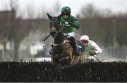 5 January 2025; Fun Fun Fun, with Patrick Mullins up, jump the last on their way to winning the The Irish Stallion Farms EBF Mares Beginners Steeplechase at Naas Racecourse in Kildare. Photo by Shauna Clinton/Sportsfile