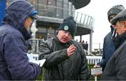 5 January 2025; Trainer Gordon Elliott, centre, speaks to journalists after sending The Yellow Clay out to win The Lawlor's Of Naas Novice Hurdle at Naas Racecourse in Kildare. Photo by Shauna Clinton/Sportsfile