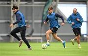 10 January 2025; Barry Baggley with Luke Turner, left, and Ryan McLaughlin, right, during a St Patrick's Athletic pre-season training session at the National Indoor Arena on the Sport Ireland Campus in Dublin. Photo by Stephen McCarthy/Sportsfile