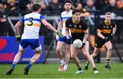11 January 2025; Tony Brosnan of Dr Crokes in action against Aidan McCrory of Errigal Ciarán, 3, during the AIB GAA Football All-Ireland Senior Club Championship semi-final match between Dr Crokes and Errigal Ciarán at Cedral St Conleth's Park in Newbridge, Kildare. Photo by Piaras Ó Mídheach/Sportsfile
