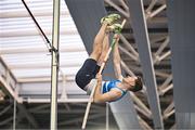 11 January 2025; Matthew Callinan Keenan of St Laurence O'Toole AC, Carlow, competes in the men's pole vault during day one of the 123.ie National Indoor AAI Games and Combined Events at the National Indoor Arena on the Sport Ireland Campus in Dublin. Photo by Sam Barnes/Sportsfile