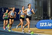 11 January 2025; Evelyn Coughlan of Tullamore Harriers AC, Offaly, right, leads the field in the women's 1500m during day one of the 123.ie National Indoor AAI Games and Combined Events at the National Indoor Arena on the Sport Ireland Campus in Dublin. Photo by Sam Barnes/Sportsfile