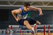 11 January 2025; Adam Nolan of St Laurence O'Toole AC, Carlow, competes in the men's 60m hurdles during day one of the 123.ie National Indoor AAI Games and Combined Events at the National Indoor Arena on the Sport Ireland Campus in Dublin. Photo by Sam Barnes/Sportsfile
