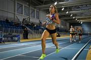 11 January 2025; Amy O'Donoghue of Dundrum South Dublin AC, on her way to winning the women's 1500m during day one of the 123.ie National Indoor AAI Games and Combined Events at the National Indoor Arena on the Sport Ireland Campus in Dublin. Photo by Sam Barnes/Sportsfile