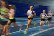 11 January 2025; Amy O'Donoghue of Dundrum South Dublin AC, on her way to winning the women's 1500m during day one of the 123.ie National Indoor AAI Games and Combined Events at the National Indoor Arena on the Sport Ireland Campus in Dublin. Photo by Sam Barnes/Sportsfile