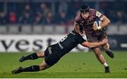 11 January 2025; Mike Haley of Munster is tackled by Ivan van Zyl of Saracens during the Investec Champions Cup Pool 3 match between Munster and Saracens at Thomond Park in Limerick. Photo by David Fitzgerald/Sportsfile
