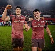 11 January 2025; Munster players Mike Haley, left, and Shane Daly celebrate after their side's victory the Investec Champions Cup Pool 3 match between Munster and Saracens at Thomond Park in Limerick. Photo by Seb Daly/Sportsfile