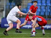 15 January 2025; Sean Gillespie of Presentation College, Bray in action against Finn Walsh of CUS during the Bank of Ireland Leinster Rugby Boys Schools Vinnie Murray Cup quarter-final match between CUS and Presentation College, Bray at Energia Park in Dublin. Photo by Tyler Miller/Sportsfile