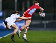 15 January 2025; Finn Walsh of CUS is tackled by James Brandon of Presentation College, Bray during the Bank of Ireland Leinster Rugby Boys Schools Vinnie Murray Cup quarter-final match between CUS and Presentation College, Bray at Energia Park in Dublin. Photo by Tyler Miller/Sportsfile