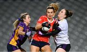 14 December 2024; Ailish Morrissey of Kilkerrin-Clonberne in action against Kilmacud Crokes goalkeeper Dearbhla Gower and Emer Sweeney, left, during the AIB LGFA All-Ireland Senior Club Championship final match between Kilmacud Crokes of Dublin and Kilkerrin-Clonberne of Galway at Croke Park in Dublin. Photo by Piaras Ó Mídheach/Sportsfile