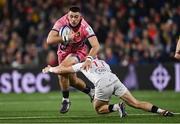 17 January 2025; Will Rigg of Exeter Chiefs is tackled by Mike Lowry of Ulster during the Investec Champions Cup Pool 1 match between Ulster and Exeter Chiefs at Kingspan Stadium in Belfast. Photo by Ramsey Cardy/Sportsfile