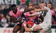 17 January 2025; Paul Brown-Bampoe of Exeter Chiefs is tackled by Mike Lowry and Nathan Doak of Ulster during the Investec Champions Cup Pool 1 match between Ulster and Exeter Chiefs at Kingspan Stadium in Belfast. Photo by Ramsey Cardy/Sportsfile