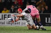 17 January 2025; Mike Lowry of Ulster is tackled by Harvey Skinner of Exeter Chiefs during the Investec Champions Cup Pool 1 match between Ulster and Exeter Chiefs at the Kingspan Stadium in Belfast. Photo by Ben McShane/Sportsfile