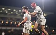 17 January 2025; Ben Carson of Ulster celebrates with teammate Mike Lowry, right, after scoring their side's fifth try during the Investec Champions Cup Pool 1 match between Ulster and Exeter Chiefs at the Kingspan Stadium in Belfast. Photo by Ben McShane/Sportsfile