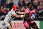 17 January 2025; Paul Brown-Bampoe of Exeter Chiefs is tackled by Mike Lowry of Ulster during the Investec Champions Cup Pool 1 match between Ulster and Exeter Chiefs at the Kingspan Stadium in Belfast. Photo by Ramsey Cardy/Sportsfile