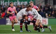 17 January 2025; Will Haydon-Wood of Exeter Chiefs is tackled by Iain Henderson, left, and Jake Flannery of Ulster during the Investec Champions Cup Pool 1 match between Ulster and Exeter Chiefs at the Kingspan Stadium in Belfast. Photo by Ramsey Cardy/Sportsfile