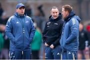 18 January 2025; Munster coaching team, from left, defence coach Denis Leamy, interim head coach Ian Costello and attack coach Mike Prendergast before the Investec Champions Cup Pool 3 match between Northampton Saints and Munster at cinch Stadium at Franklins Gardens in Northampton, England. Photo by Matt Impey/Sportsfile