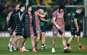 18 January 2025; Munster players, including Alex Kendellen and Mike Haley after their side's defeat in the Investec Champions Cup Pool 3 match between Northampton Saints and Munster at cinch Stadium at Franklins Gardens in Northampton, England. Photo by Matt Impey/Sportsfile