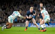 18 January 2025; Jamie Osborne of Leinster in action against Ollie Lawrence, left, and Finn Russell of Bath during the Investec Champions Cup Pool 2 match between Leinster and Bath at the Aviva Stadium in Dublin. Photo by Brendan Moran/Sportsfile
