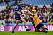 19 January 2025; Cathal McCarthy of Sarsfields in action against Peter Feeney, centre, and Kevin Burke of Na Fianna during the AIB GAA Hurling All-Ireland Senior Club Championship final match between Na Fianna and Sarsfields at Croke Park in Dublin. Photo by Ben McShane/Sportsfile