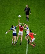 19 January 2025; Referee Paddy Neilan throws in the ball between Peadar Ó Cofaigh Byrne, left, and Peter Duffy of Cuala, and Joe Oguz, left, and Ben McDonnell of Errigal Ciarán to start the AIB GAA Football All-Ireland Senior Club Championship final match between Cuala and Errigal Ciarán at Croke Park in Dublin. Photo by Daire Brennan/Sportsfile