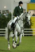 24 August 2004; Ireland's Marion Hughes on Fortunus, in action during the third round of the Individual Qualifying and the final round of the Team Jumping Final. Markopoulo Olympic Equestrian Centre. Games of the XXVIII Olympiad, Athens Summer Olympics Games 2004, Athens, Greece. Picture credit; Brendan Moran / SPORTSFILE