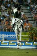 24 August 2004; Ireland's Marion Hughes on Fortunus, in action during the third round of the Individual Qualifying and the final round of the Team Jumping Final. Markopoulo Olympic Equestrian Centre. Games of the XXVIII Olympiad, Athens Summer Olympics Games 2004, Athens, Greece. Picture credit; Brendan Moran / SPORTSFILE