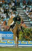 24 August 2004; Ireland's Kevin Babbington, on Carling King, clears the water jump during the third round of the Individual Qualifying and the final round of the Team Jumping Final. Markopoulo Olympic Equestrian Centre. Games of the XXVIII Olympiad, Athens Summer Olympics Games 2004, Athens, Greece. Picture credit; Brendan Moran / SPORTSFILE