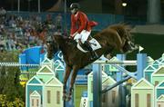 24 August 2004; Ludger Beerbaum on Goldfever on their way to securing the Gold medal for Germany during the final round of the Team Jumping Final. Markopoulo Olympic Equestrian Centre. Games of the XXVIII Olympiad, Athens Summer Olympics Games 2004, Athens, Greece. Picture credit; Brendan Moran / SPORTSFILE