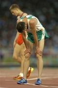 25 August 2004; Ireland's Alastair Cragg after finishing his heat of the Men's 5000m. Olympic Stadium. Games of the XXVIII Olympiad, Athens Summer Olympics Games 2004, Athens, Greece. Picture credit; Brendan Moran / SPORTSFILE