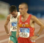 25 August 2004; Ireland's Mark Carroll (2127) after finishing his heat of the Men's 5000m and failing to qualify for the final. Olympic Stadium. Games of the XXVIII Olympiad, Athens Summer Olympics Games 2004, Athens, Greece. Picture credit; Brendan Moran / SPORTSFILE